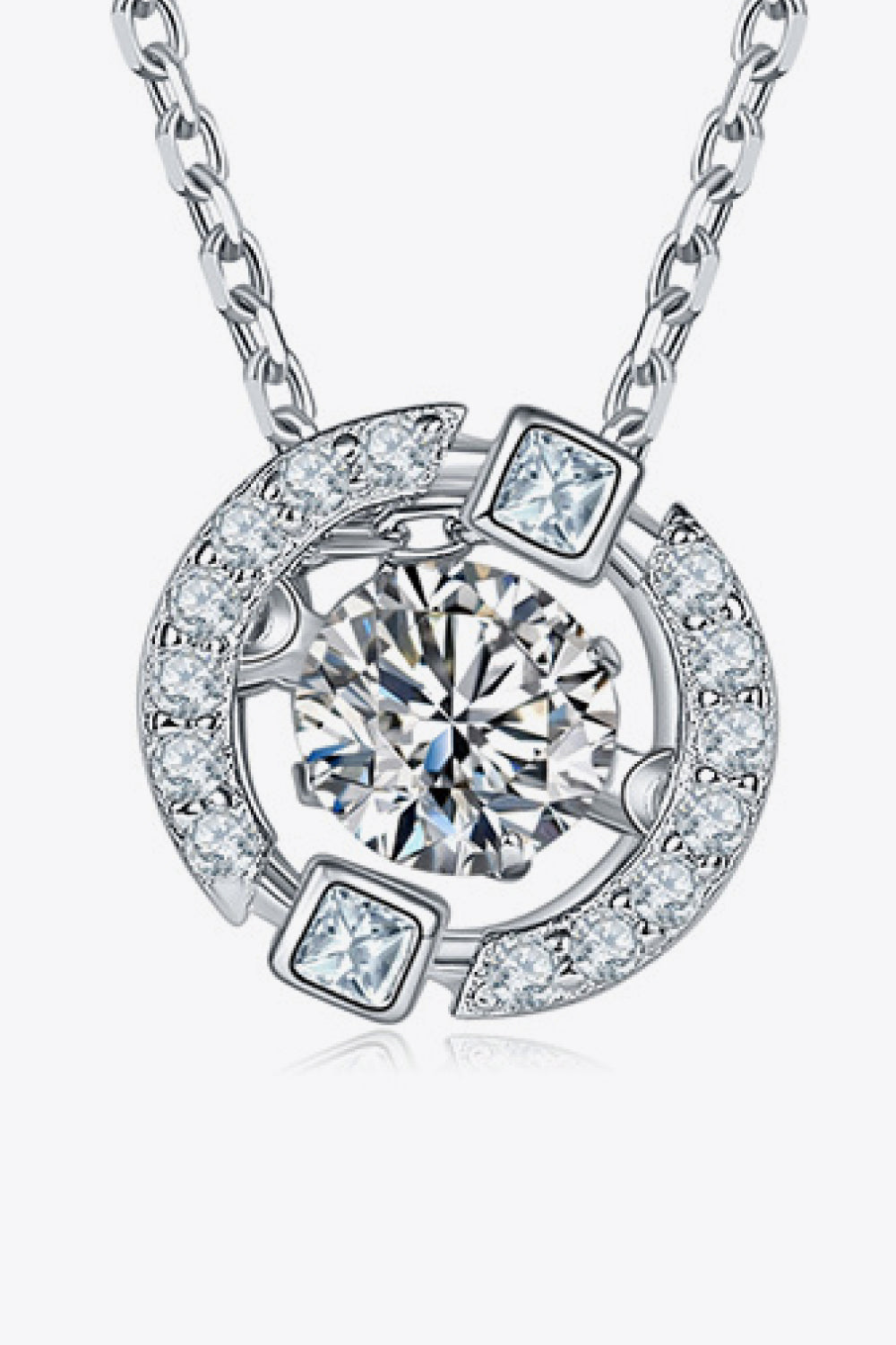 Close view of the round moissanite pendant with curved pavé accents and square stones.