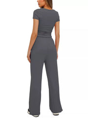 Back view of the charcoal-gray tank and matching pants.