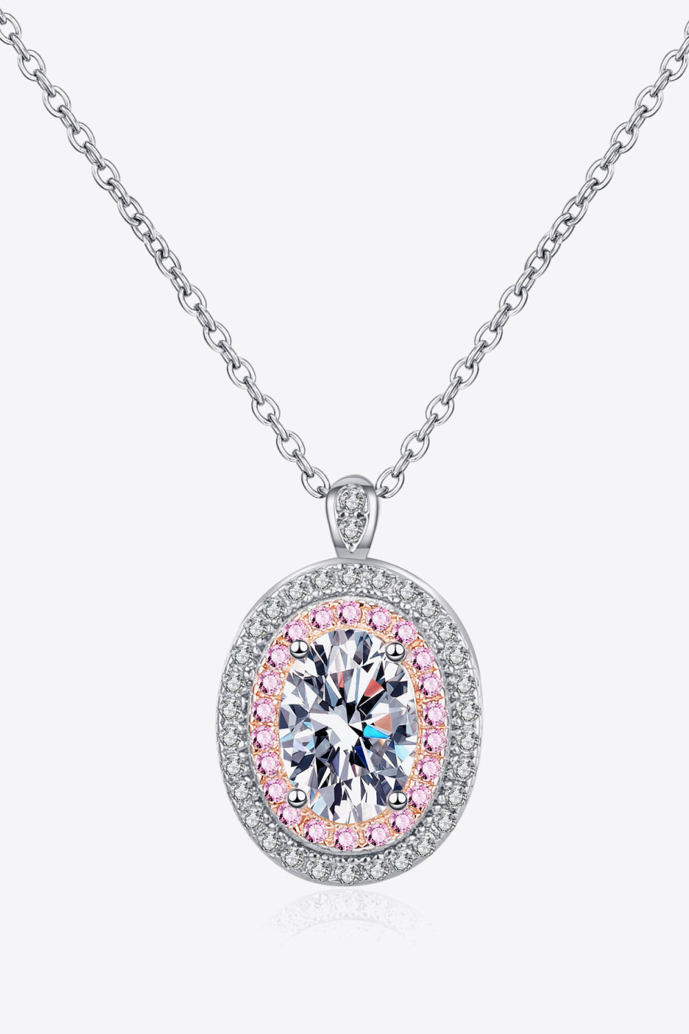 Front view of an oval pendant necklace with pink and clear stone borders