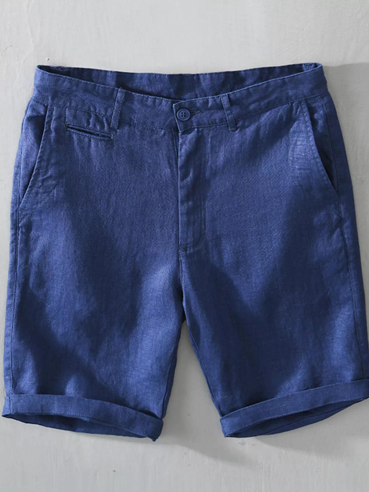 Sapphire-blue loose-fit shorts, front view