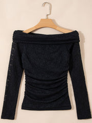 Back product view of black top with gathered detailing