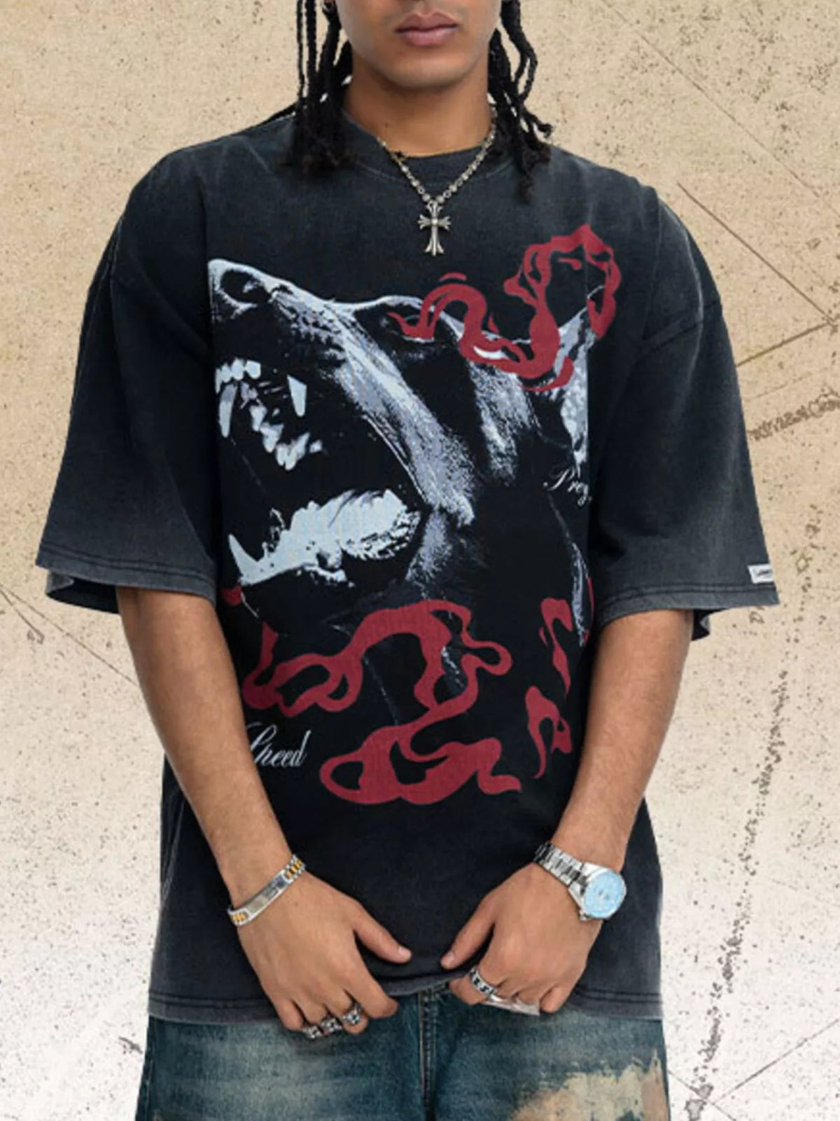 Model wearing the charcoal wolf-print T-shirt, front view