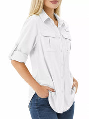 White button-down shirt with rolled sleeves, three-quarter view on model