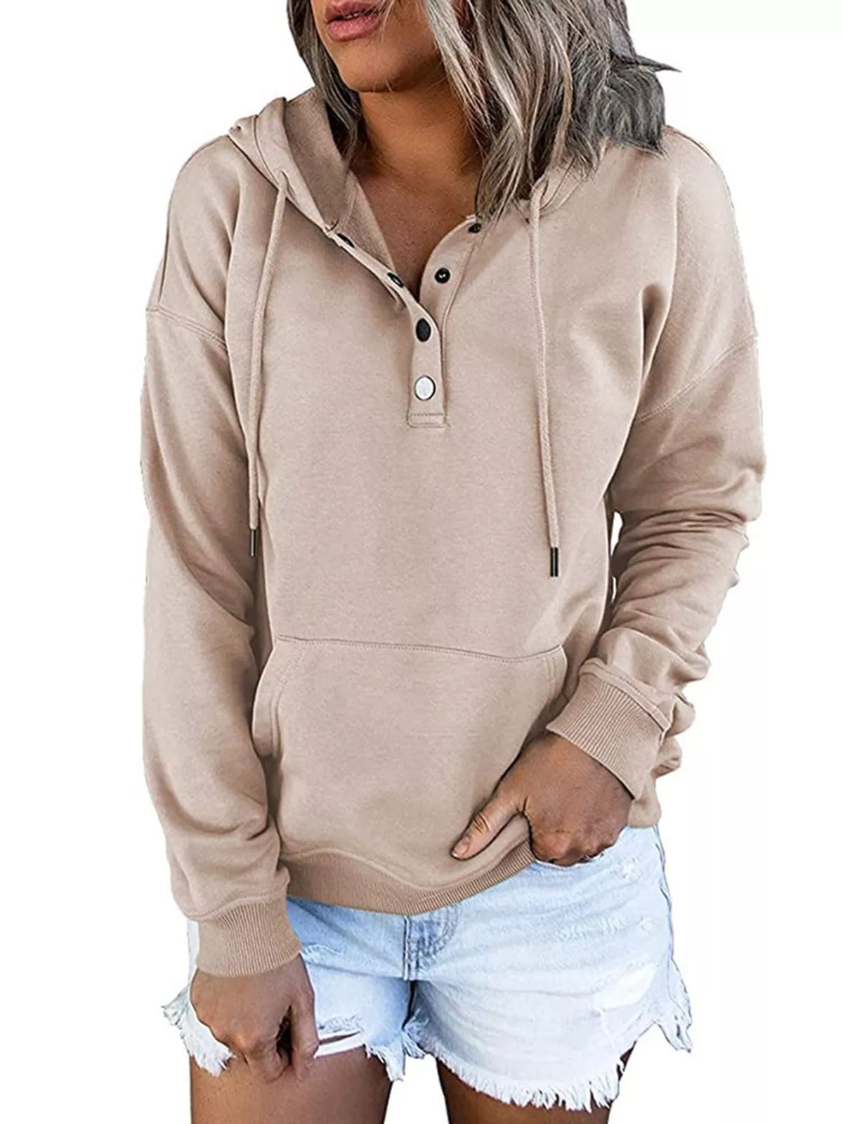 Women’s plus-size kangaroo-pocket drawstring hoodie in apricot front pose with hand at pocket