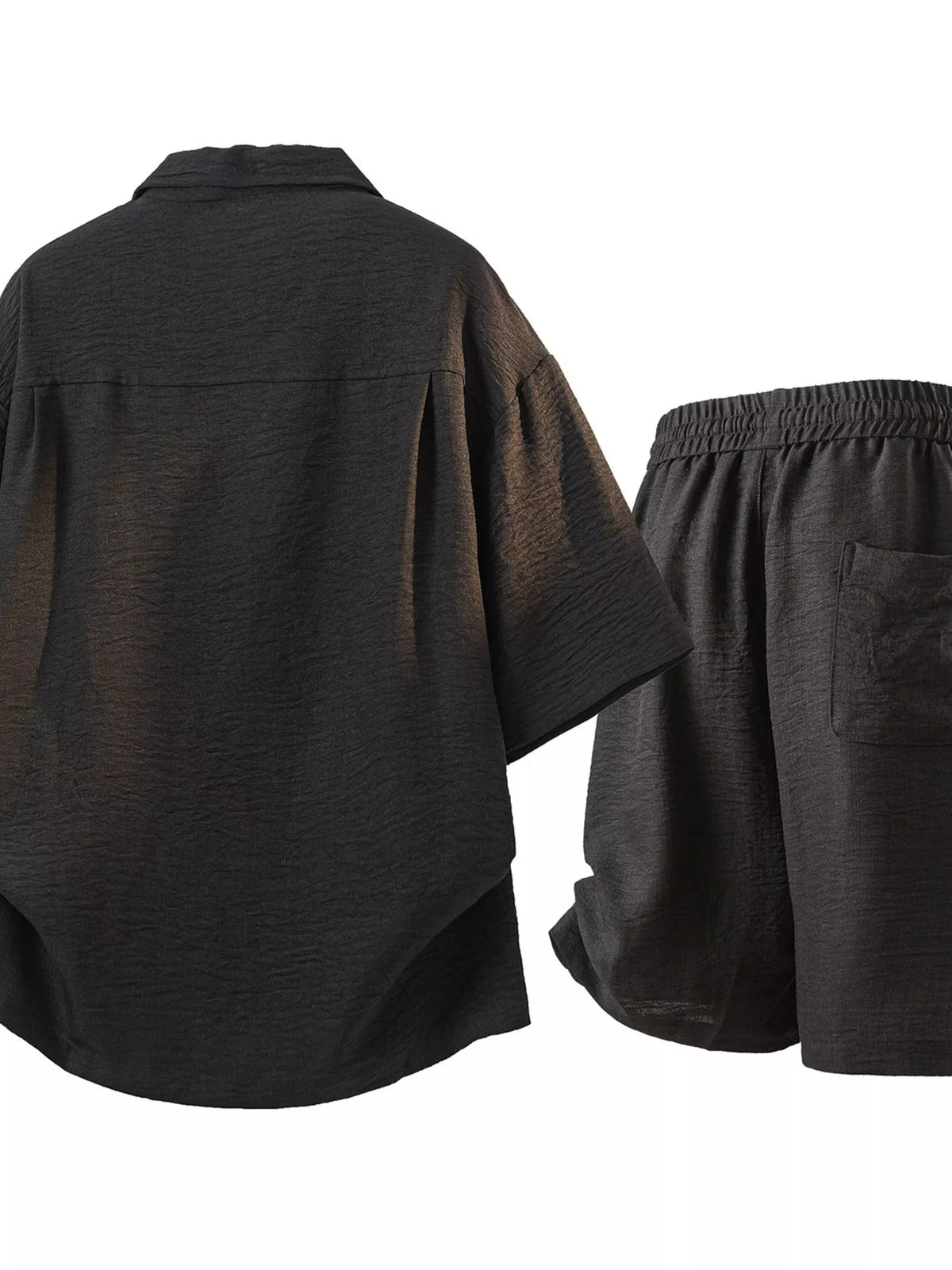 Black shirt and shorts set displayed from the back.