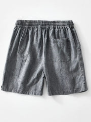 Back view of gray washed shorts with rear patch pocket
