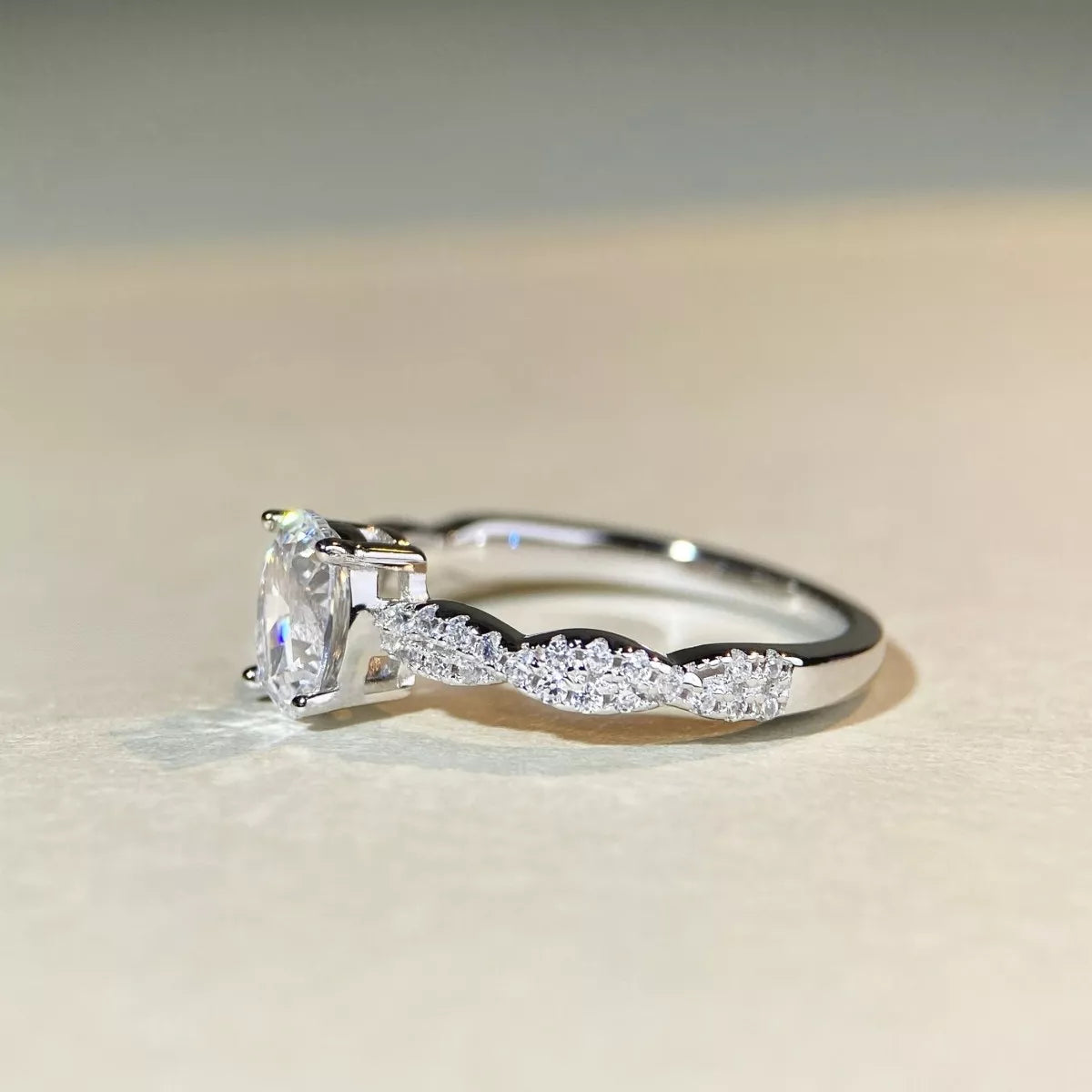 Detail view of the oval centre stone and ring setting