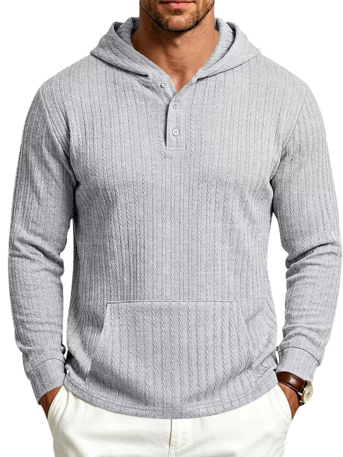 Model wearing light gray textured hoodie with kangaroo pocket
