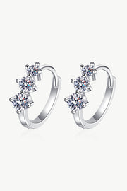 Pair of moissanite huggie earrings with stones along the front