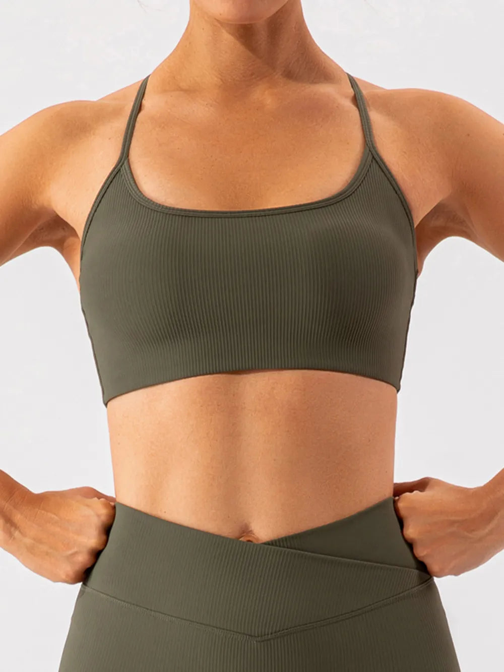 Close-up of olive green ribbed active bra front