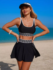 Black swim set with white-edged tank straps and patterned trim