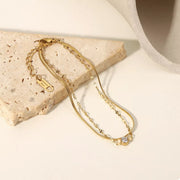 Close-up of zircon accents on layered bracelet