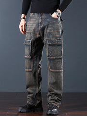 Angled front view of faded dark denim cargo jeans with large leg pockets