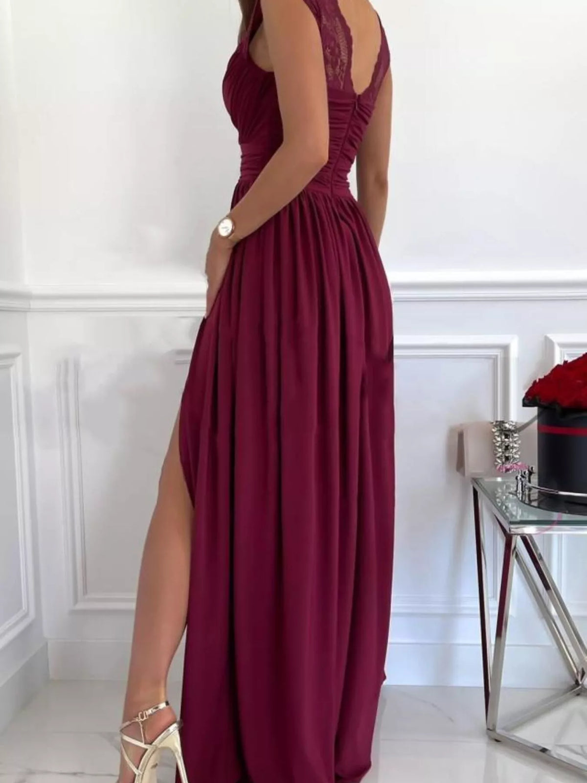 Side-back view of burgundy maxi dress with lace shoulder straps