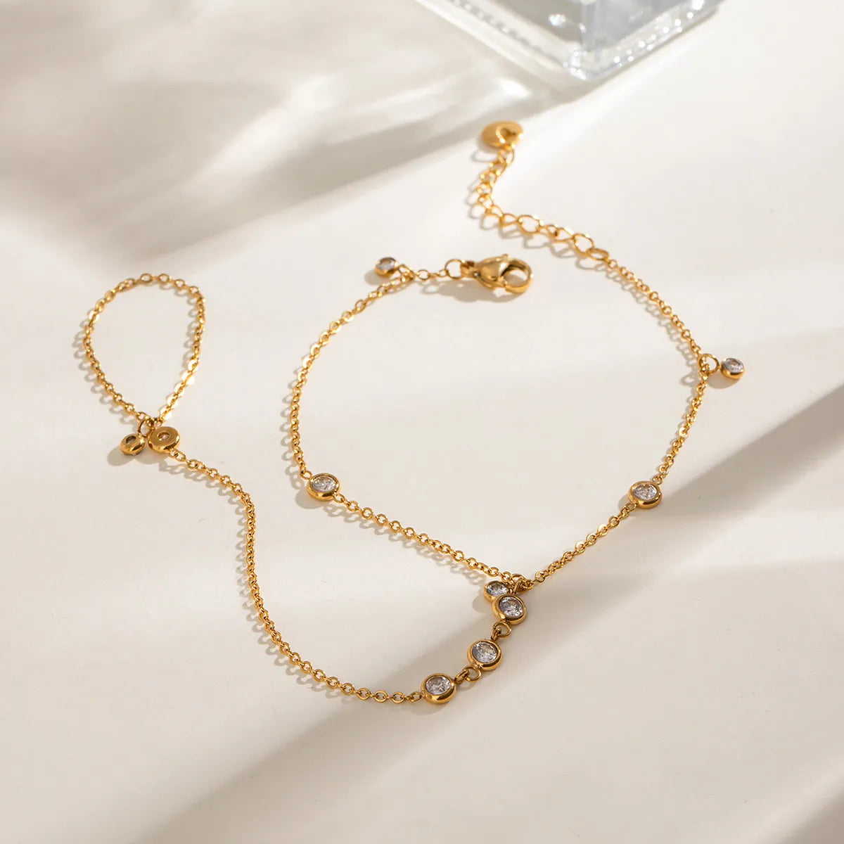 Gold hand chain arranged to show wrist and finger loops