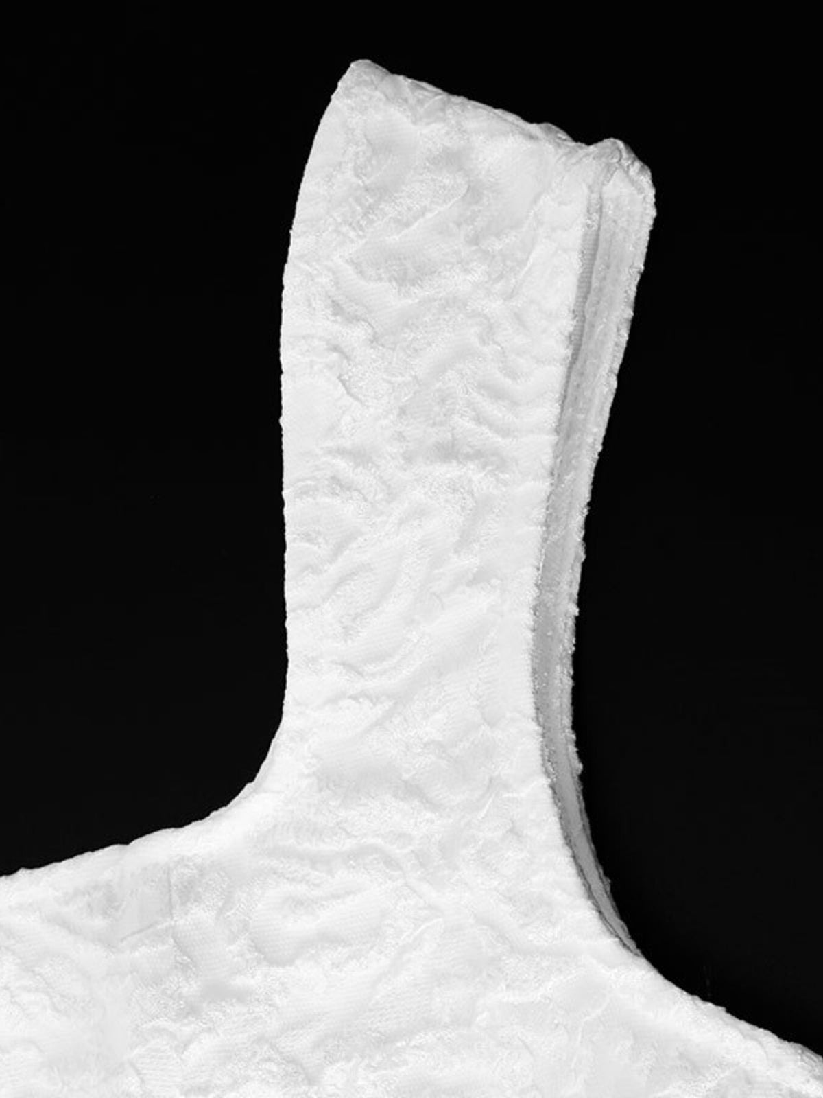 Close-up of wide shoulder strap and raised fabric texture
