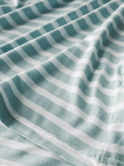 Sage green and white striped shirt fabric close-up
