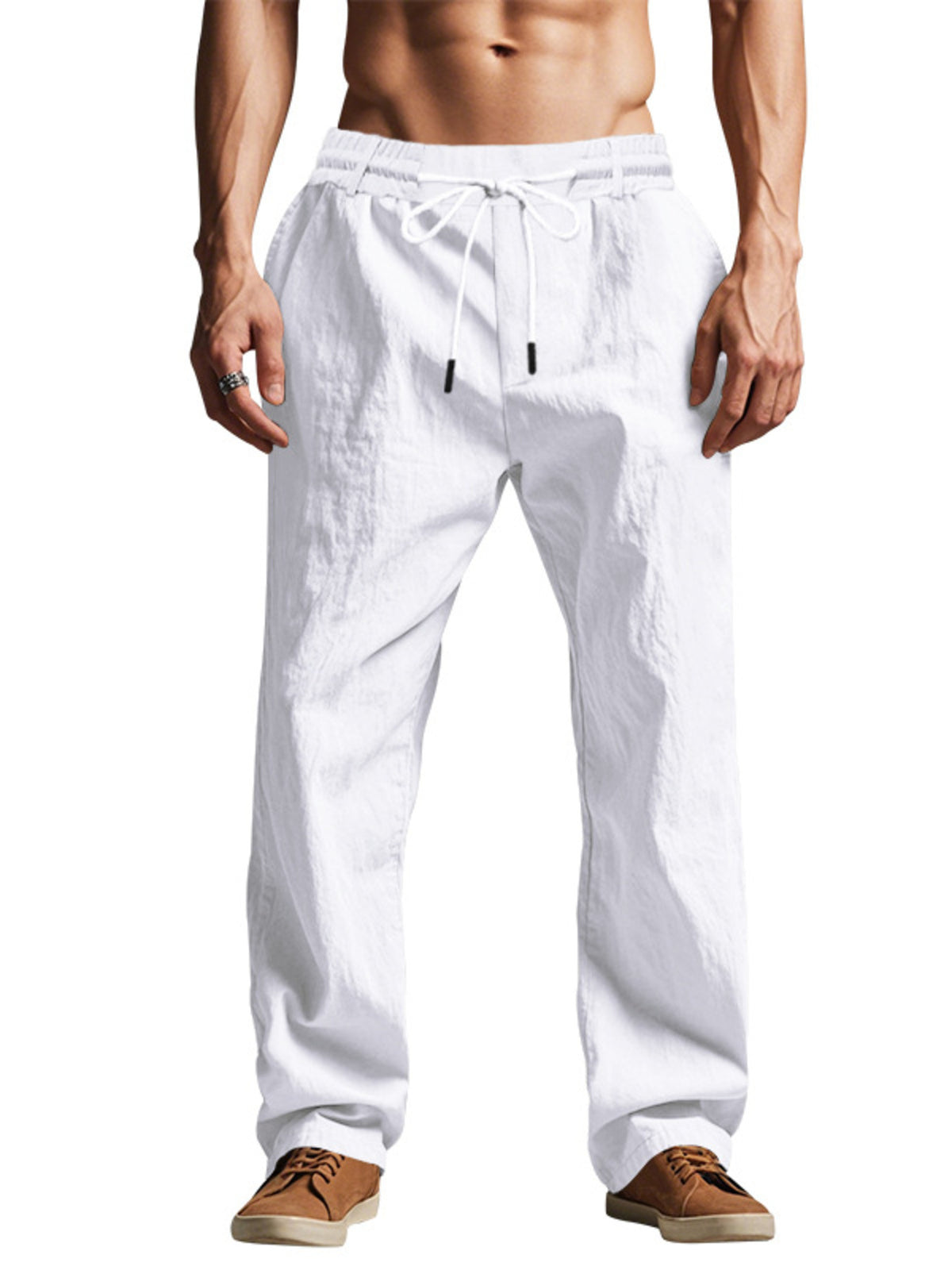 Model wearing white pants with hands in pockets