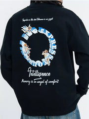 Close view of the navy shirt's large circular floral back graphic and lettering