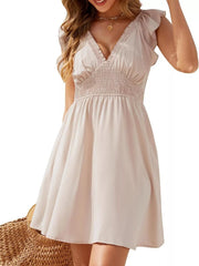 White sleeveless V-neck smocked-waist mini dress
