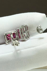 Shiny and Elegant 2 Carat Moissanite Stud Earrings — Side view showing geometric stud posts and settings