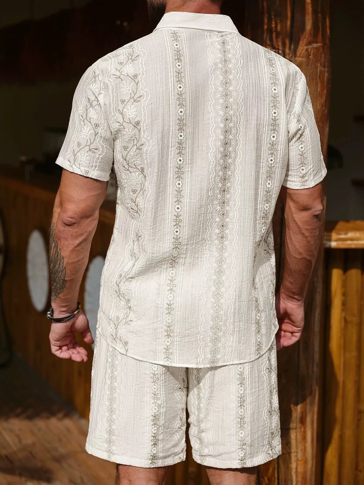 Back view of cream floral shirt and matching shorts