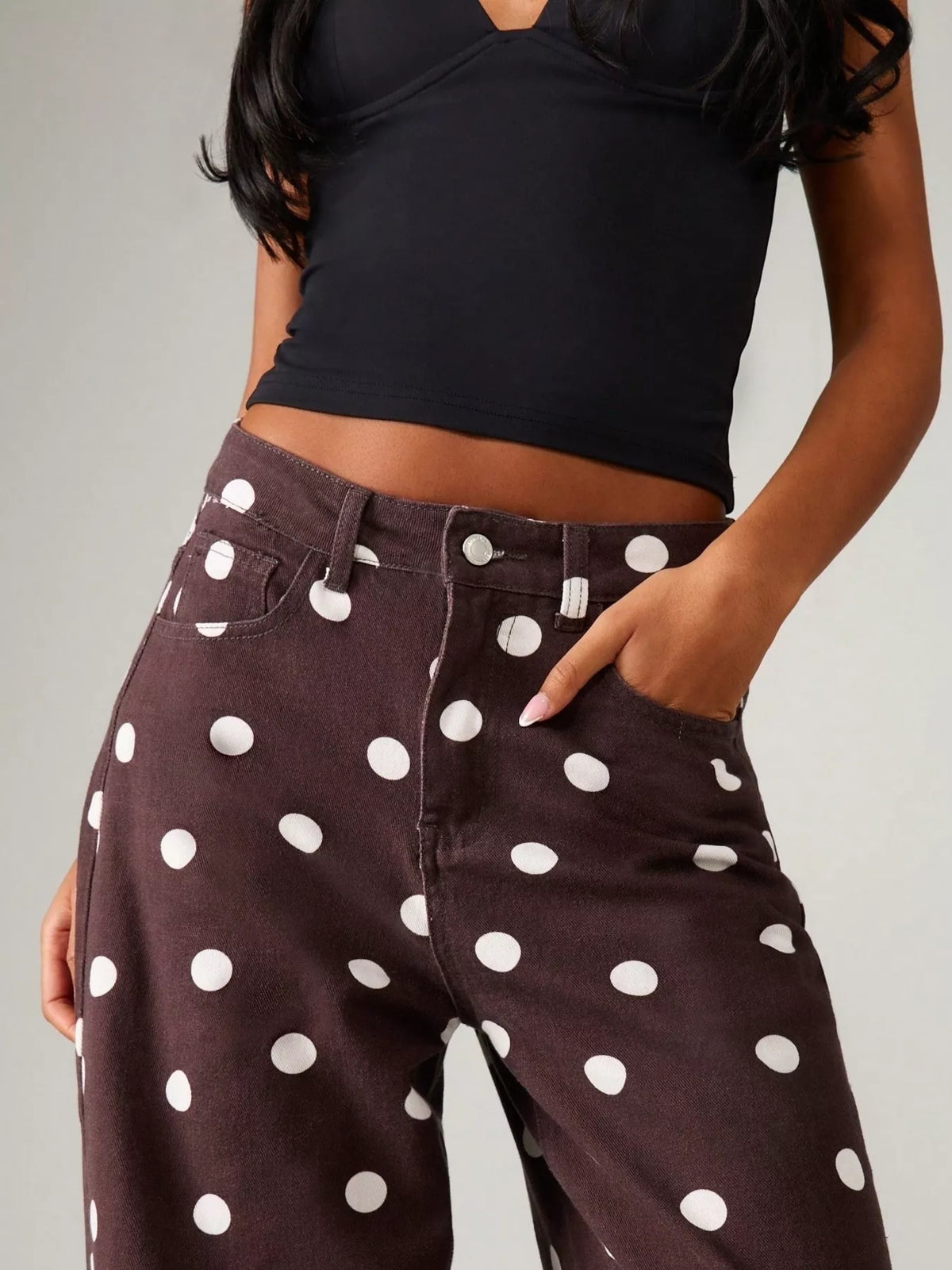 Back view of brown wide-leg pants with white dots