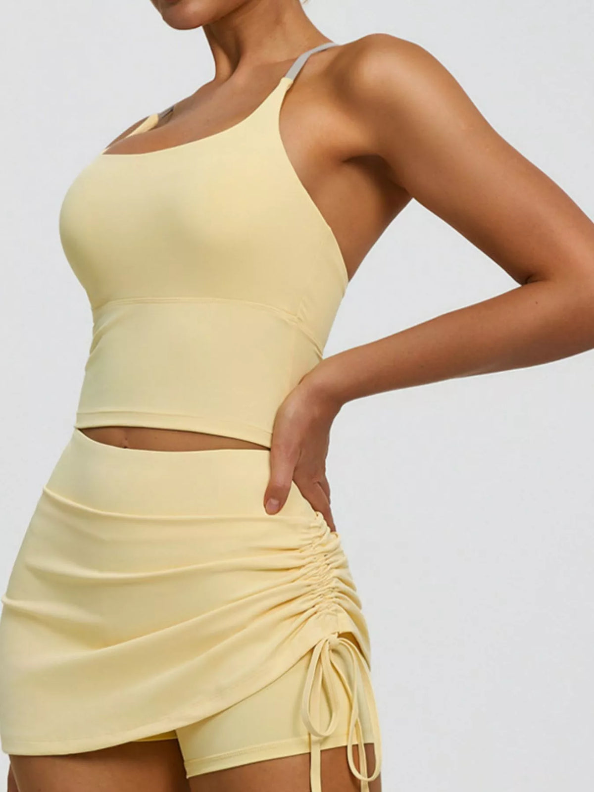 Pastel yellow criss-cross back active bra, side view