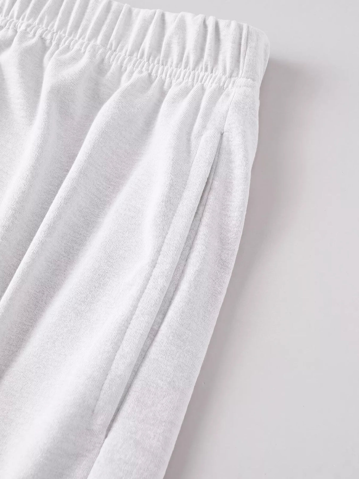 Close-up of elastic waistband on white shorts