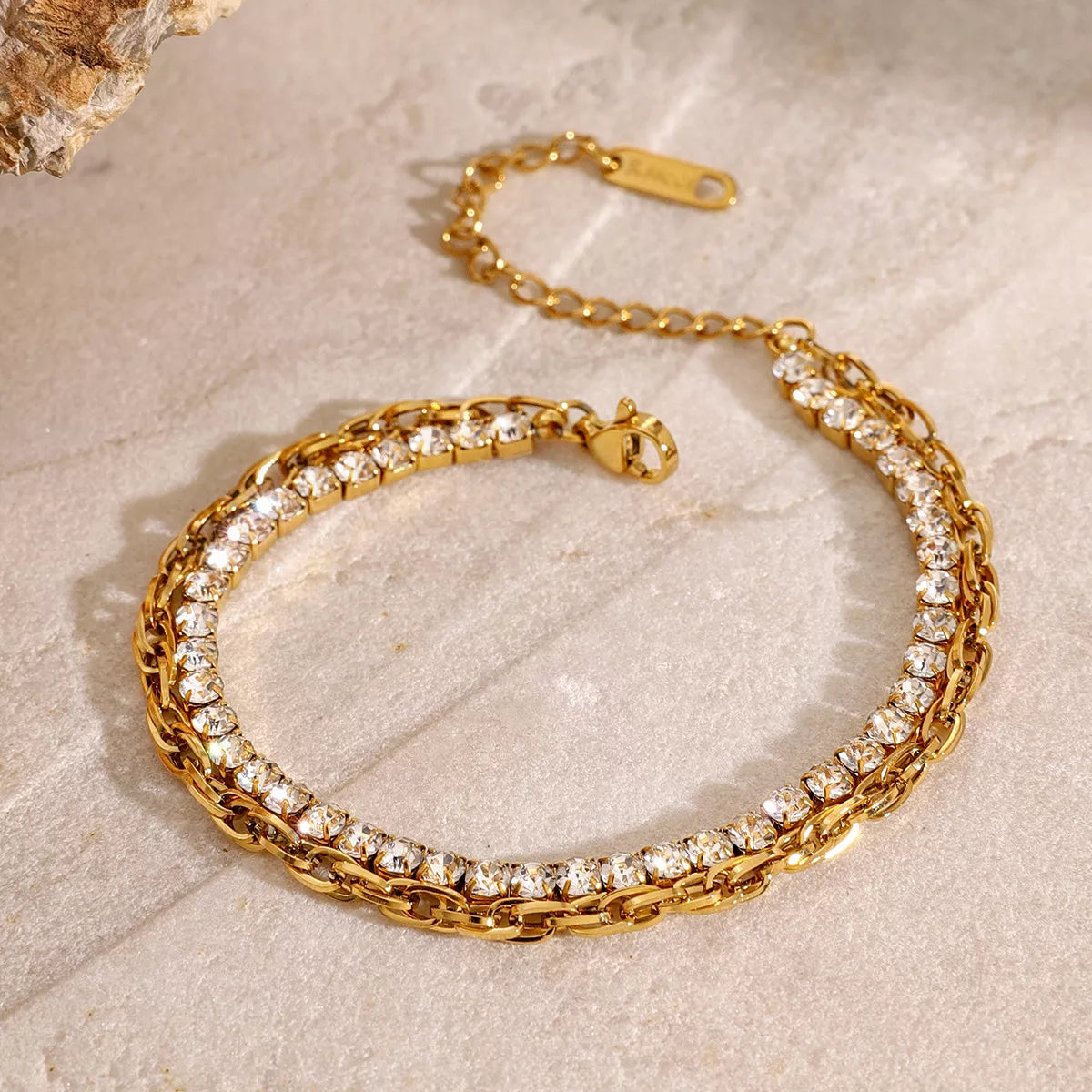 Double-layer gold rhinestone bracelet displayed flat