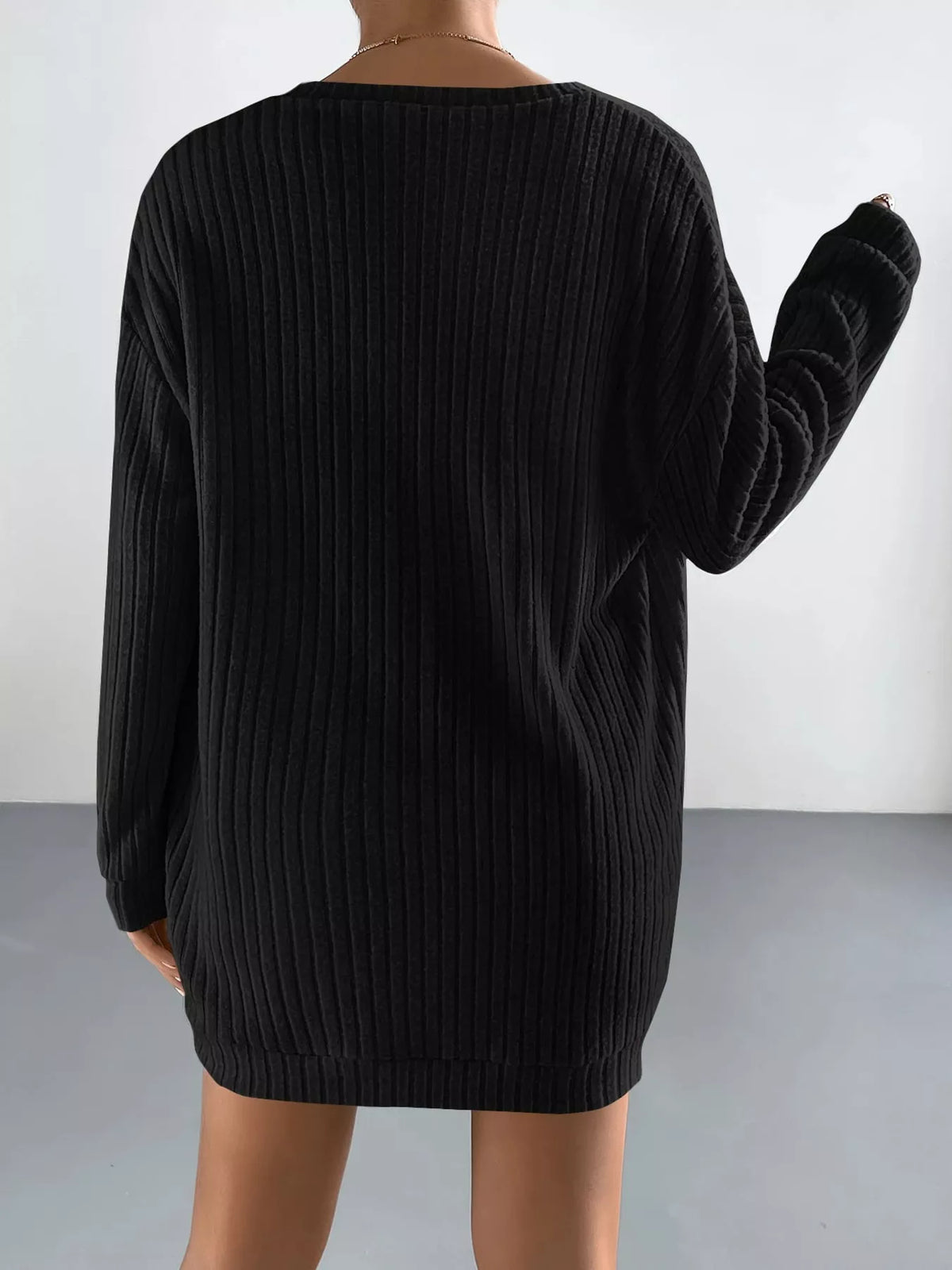 Back view of the black longline ribbed cardigan