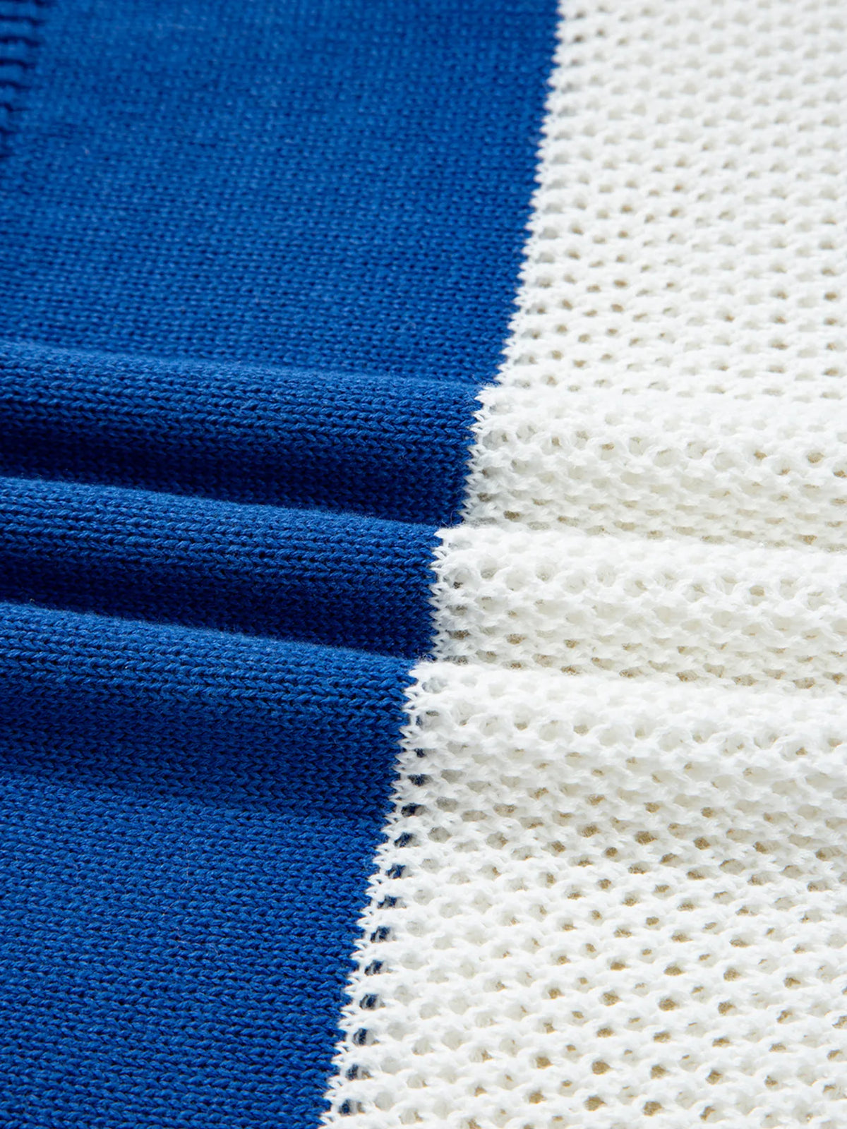 Close-up of blue and white crochet-knit fabric