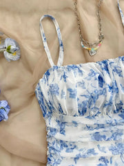 Detail of blue floral ruched dress neckline and bodice