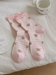 Pink striped bear socks shown together
