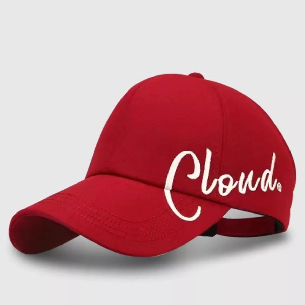 Burgundy baseball cap with prominent white Cloud script embroidery
