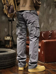 Back view of gray cargo pants showing rear and side cargo pockets.