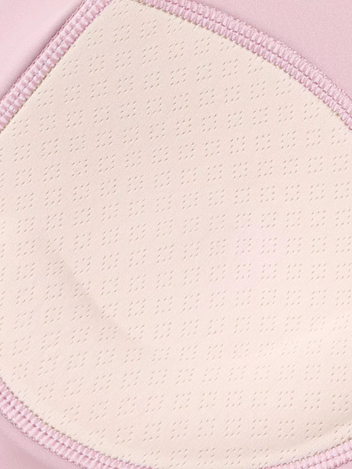 Close-up of crossed back straps and keyhole opening