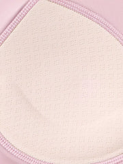 Close-up of crossed back straps and keyhole opening