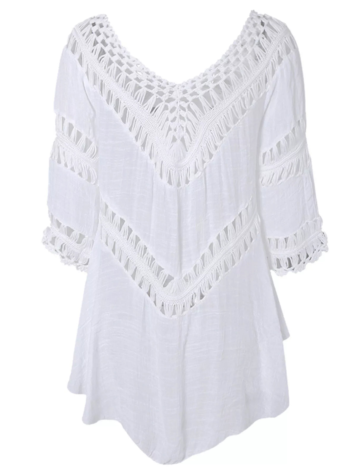 Detail of the crochet sleeve and hem trim on the white dress