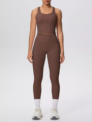 Brown tank and high-waisted leggings in a front three-quarter pose