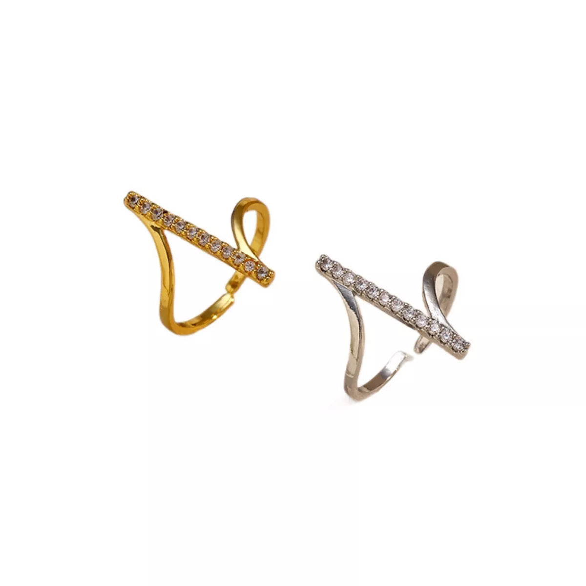 Gold-tone and silver-tone rings shown side by side on white