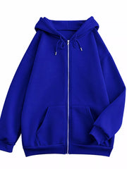 Front view of the royal blue oversized zip-up hoodie with drawstring hood and pockets