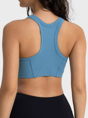 Blue cropped tank with racerback straps, rear view