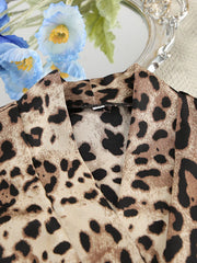 Close-up of leopard-print cardigan collar and neckline