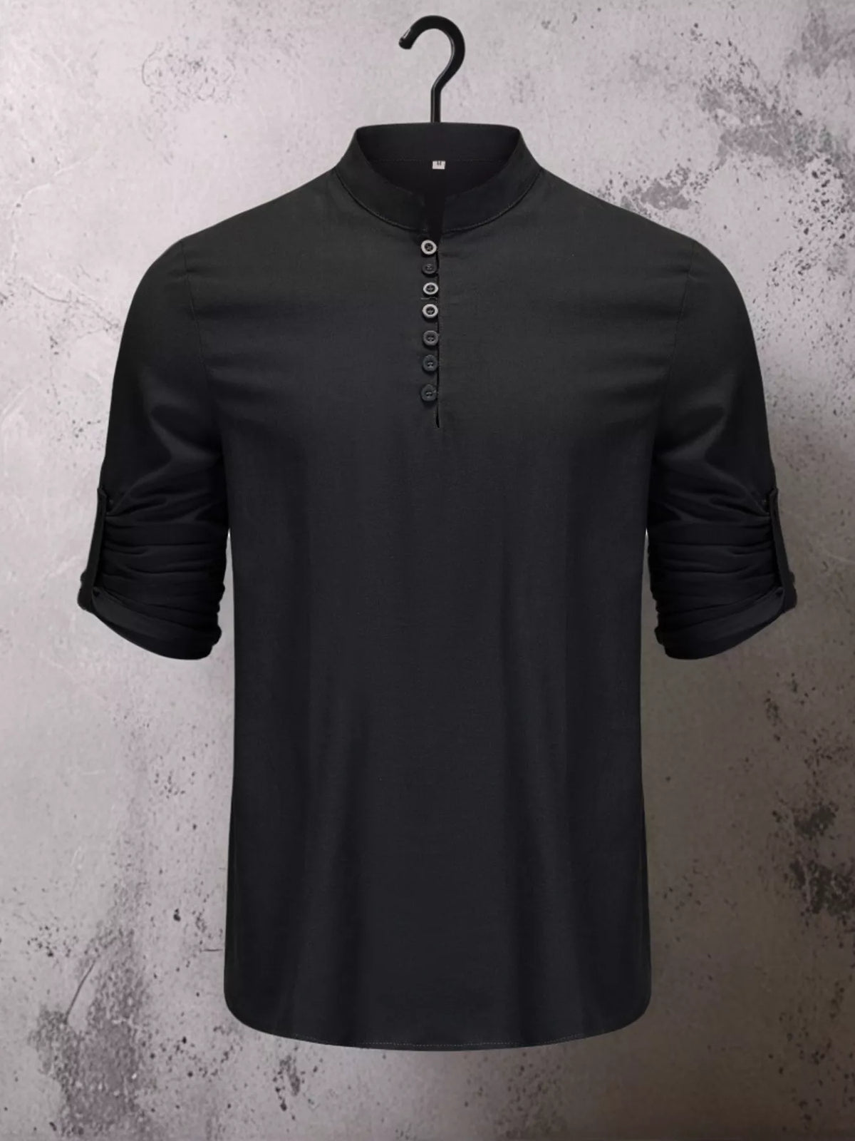 Tan shirt worn with jeans, showing short button placket