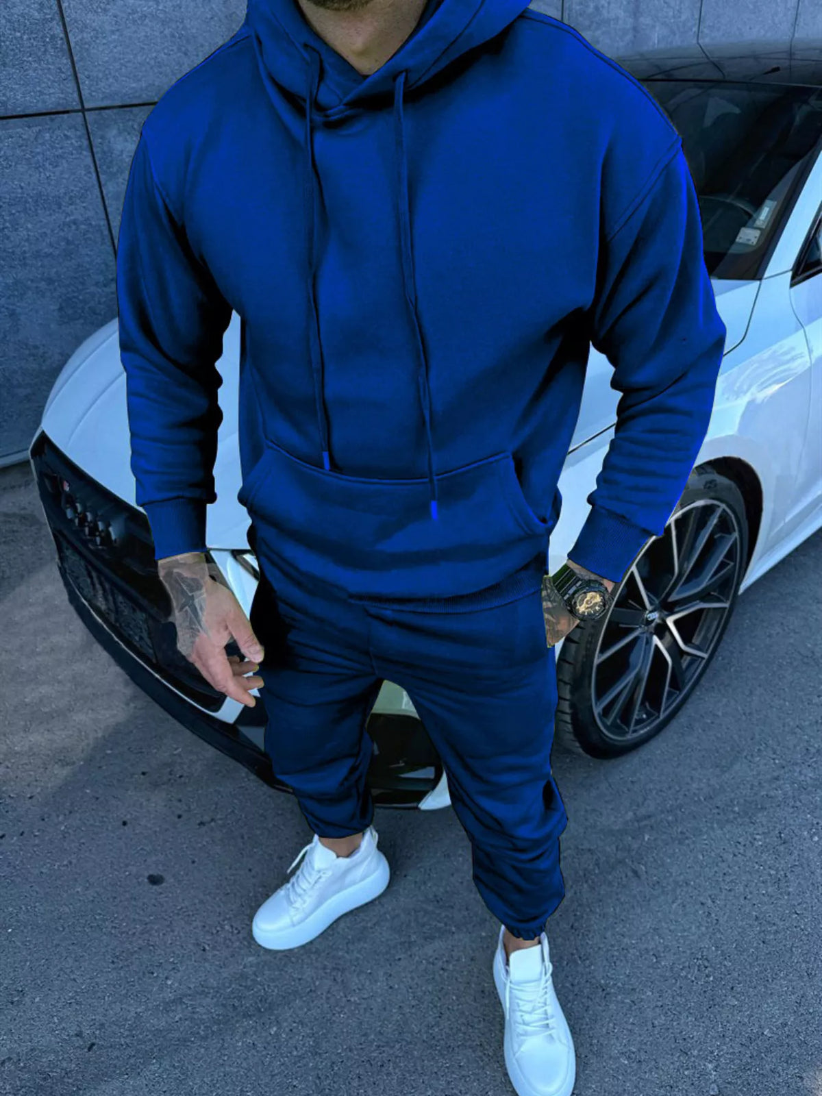 Model wearing the matching hoodie and pants set