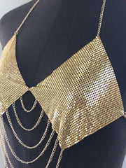 Gold chainmail halter top on display form, front