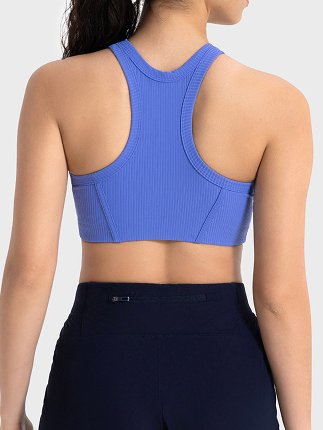 Bright blue cropped tank with racerback straps, rear view