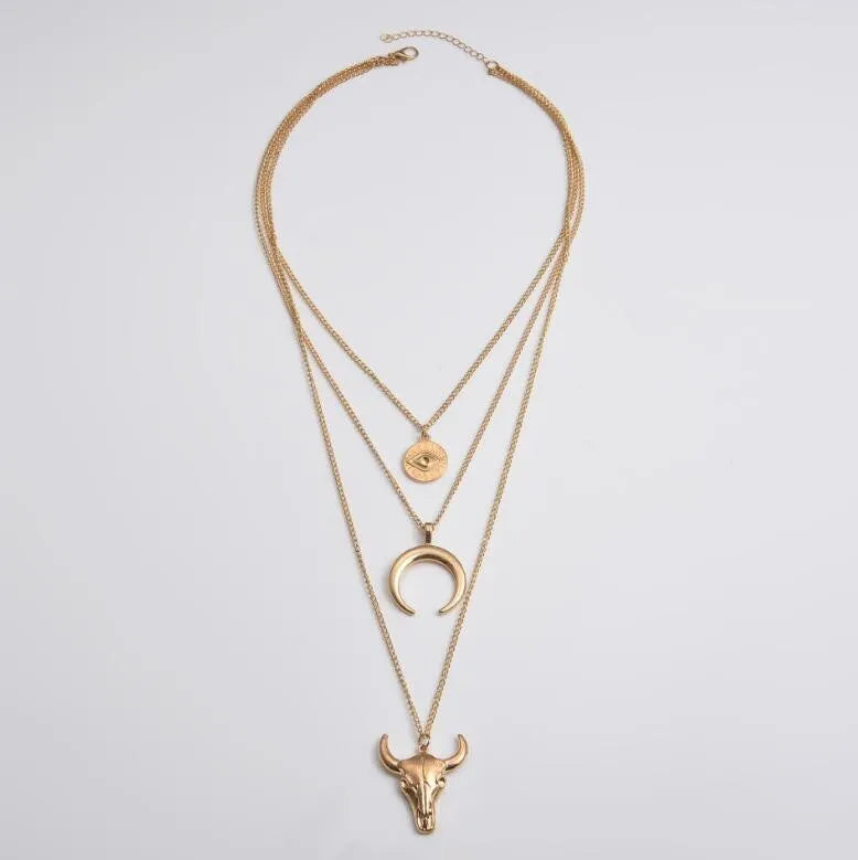 Full gold-tone layered necklace showing the clasp and three pendant chains