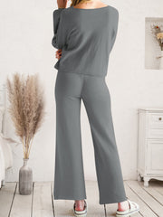 Charcoal drawstring lounge pants shown from the waist down
